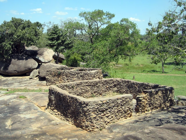 Stone walls of Fort Patiko among rocks and trees