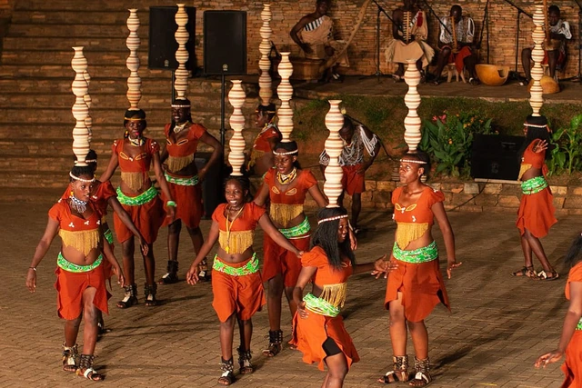 Ndere dancers performing with pots balanced on their heads